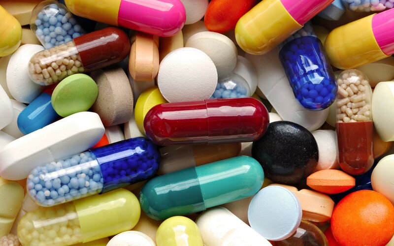 assorted pills and capsules