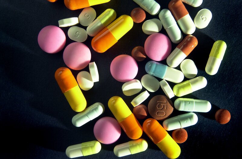 Assorted Pills and Capsules — Black, Dramatic