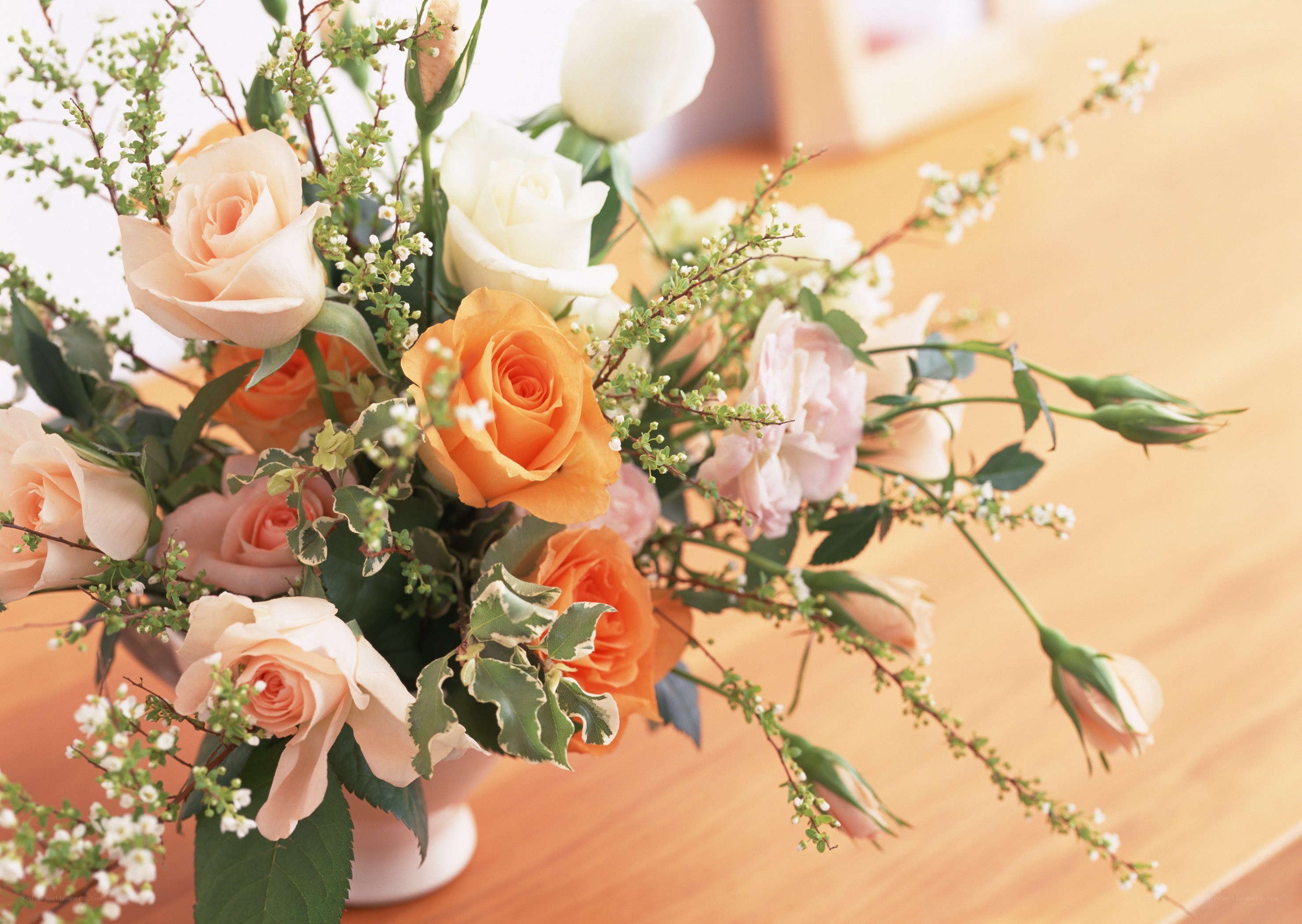 Assorted roses in a vase