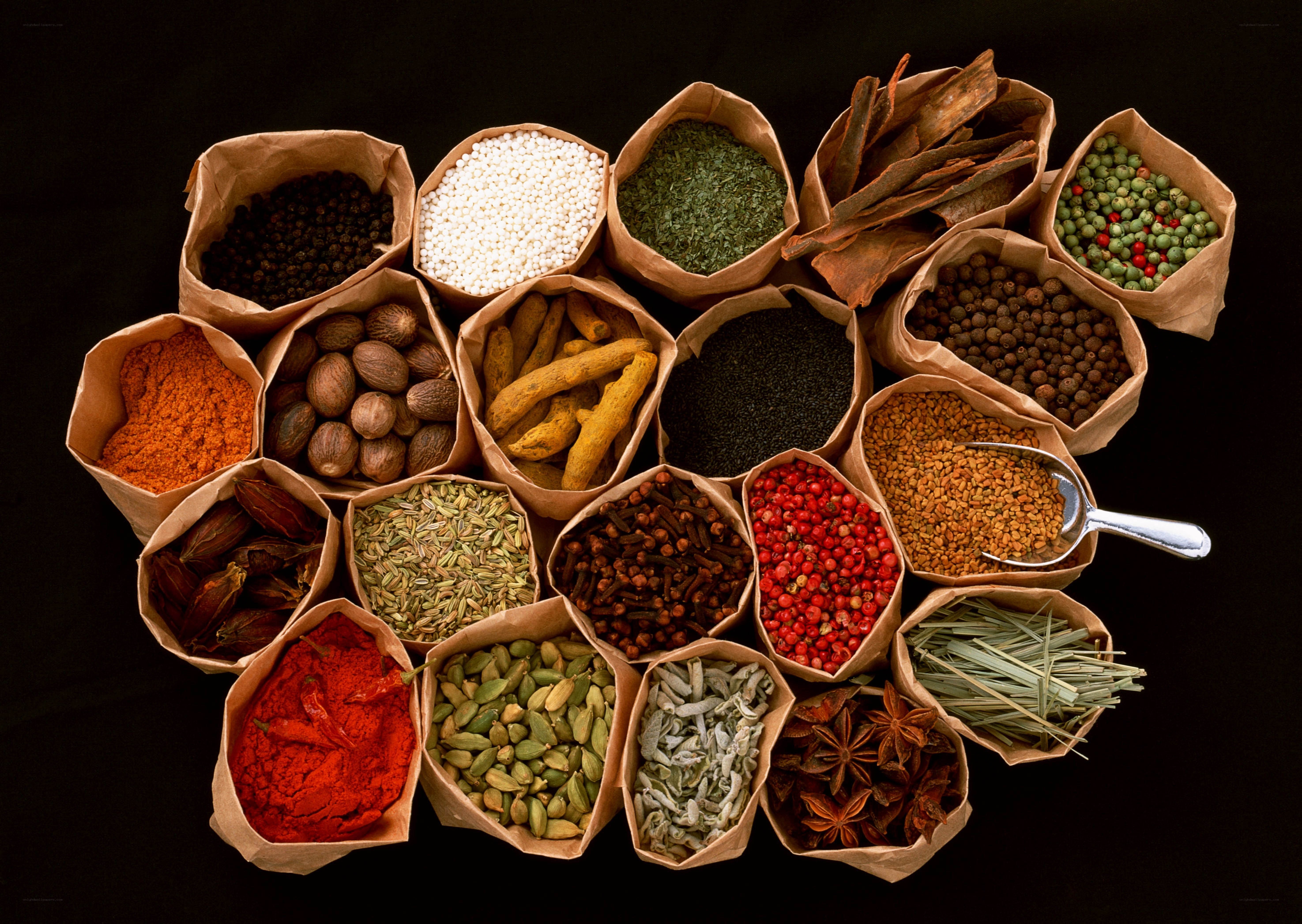 Assorted spices in paper bags