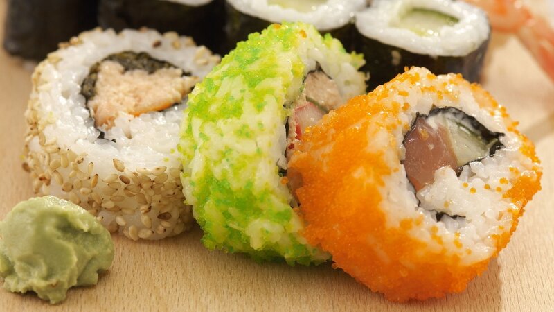 assorted sushi rolls with wasabi