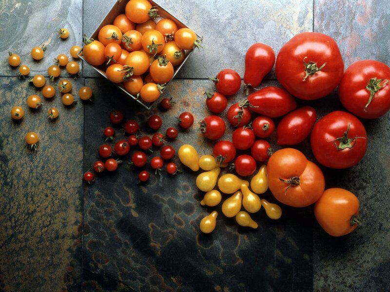 Assorted tomatoes on stone