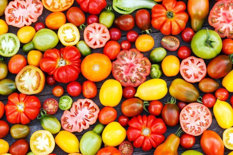 Assorted Tomatoes on Wood