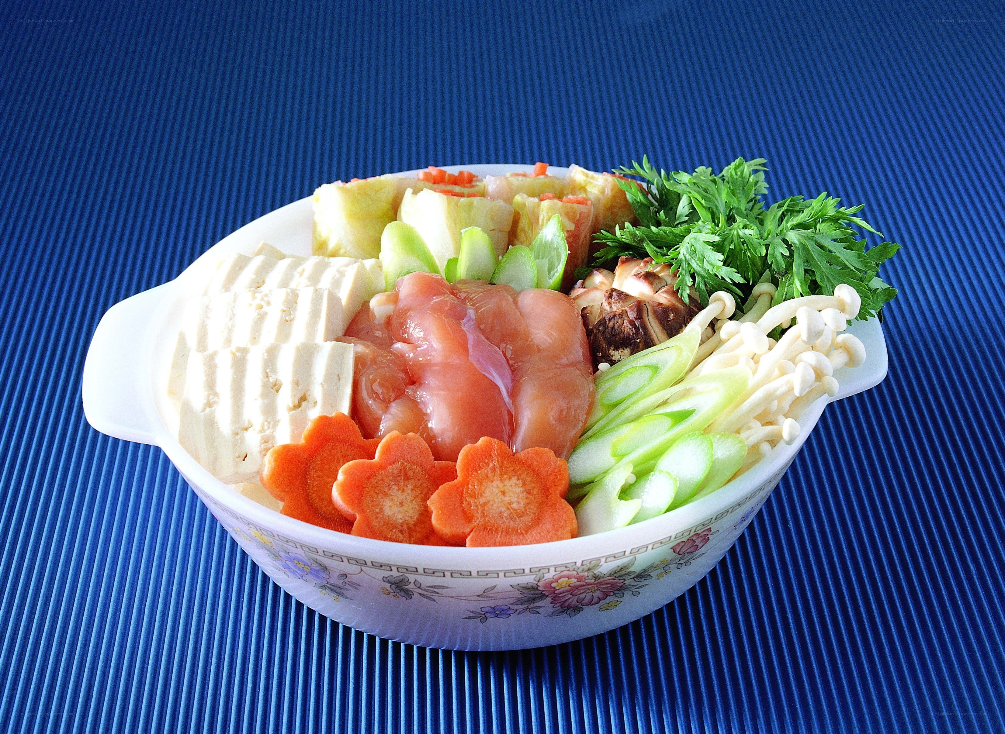 Assorted vegetables and tofu in a bowl