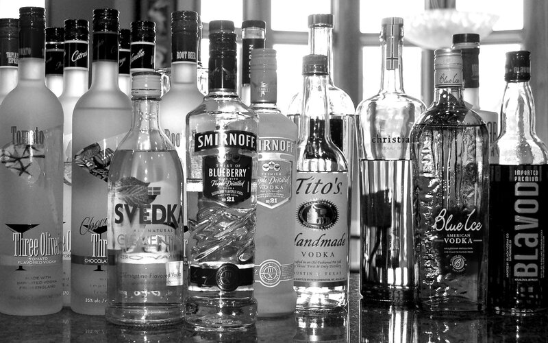Assorted vodka bottles on a counter