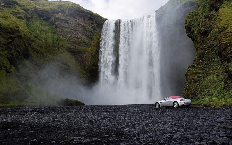 Aston Martin at a waterfall