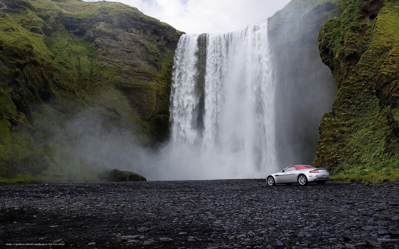 Aston Martin at a waterfall