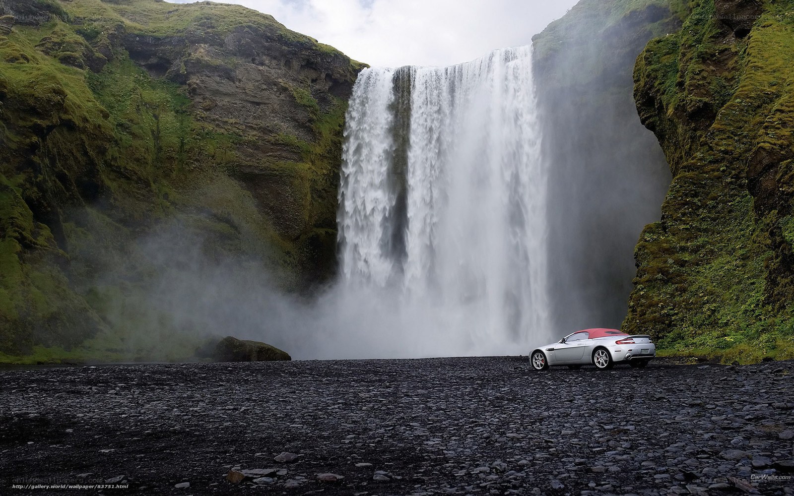 Aston Martin at a waterfall