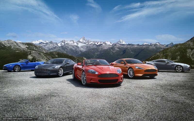 Aston Martin cars in the mountains