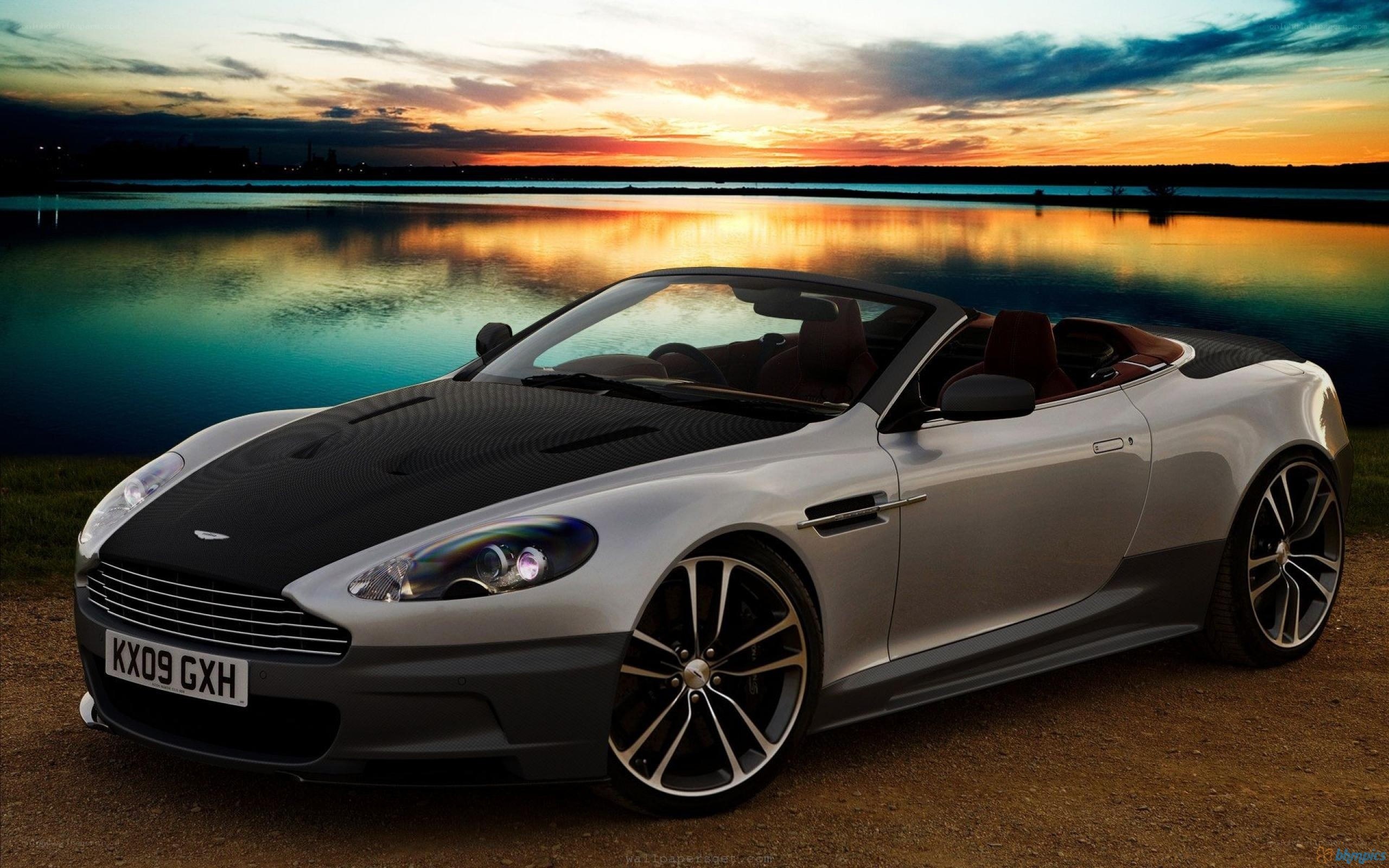 Aston Martin convertible at sunset