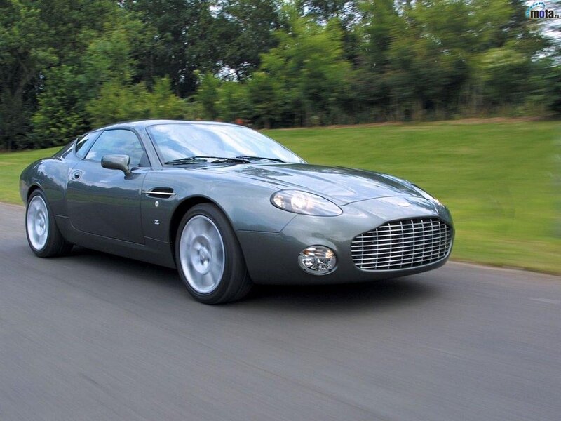 Aston Martin DB7 driving on a road