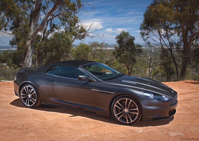 Aston Martin DB9 on a dirt road