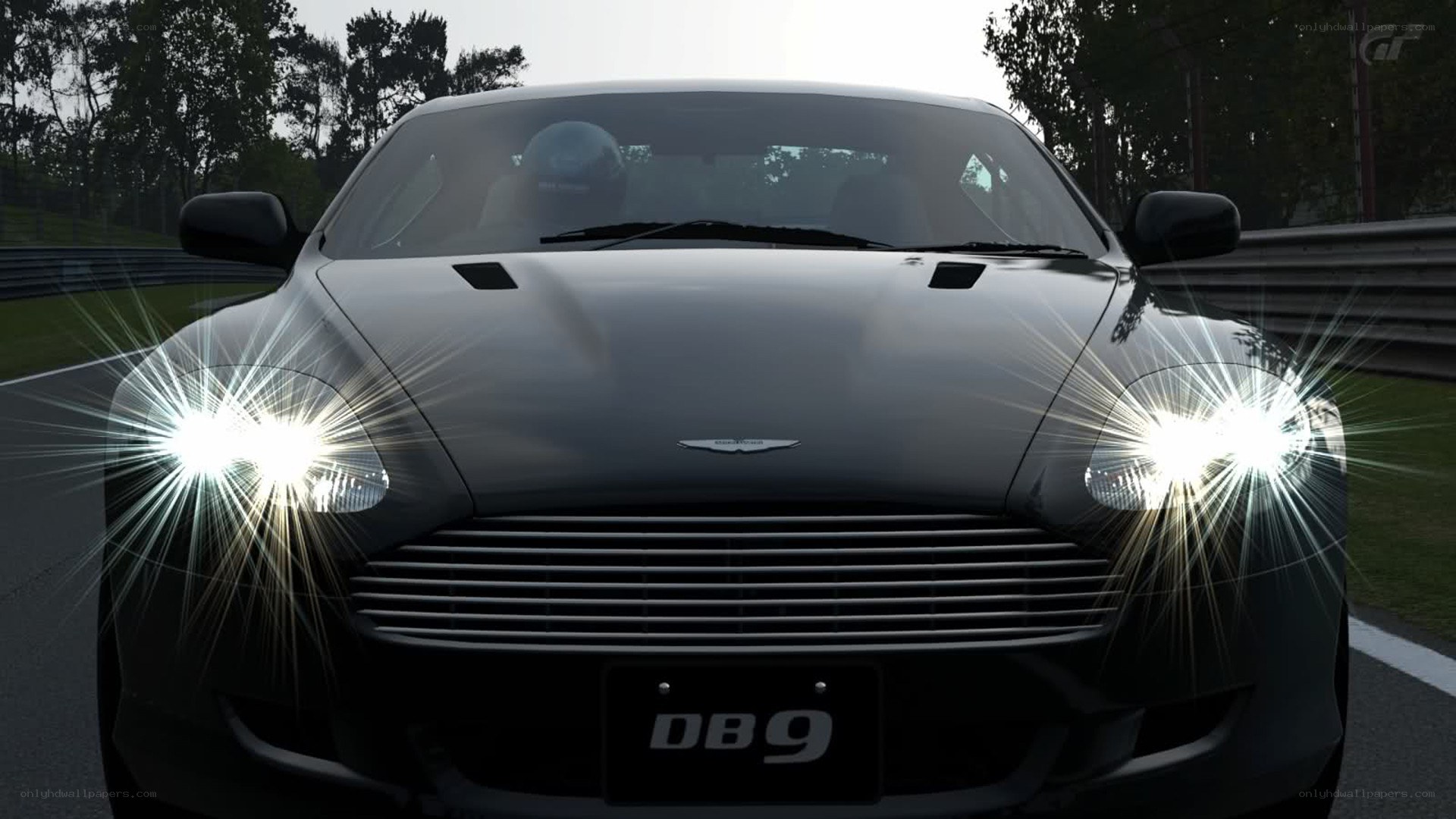Aston Martin DB9 on a racetrack