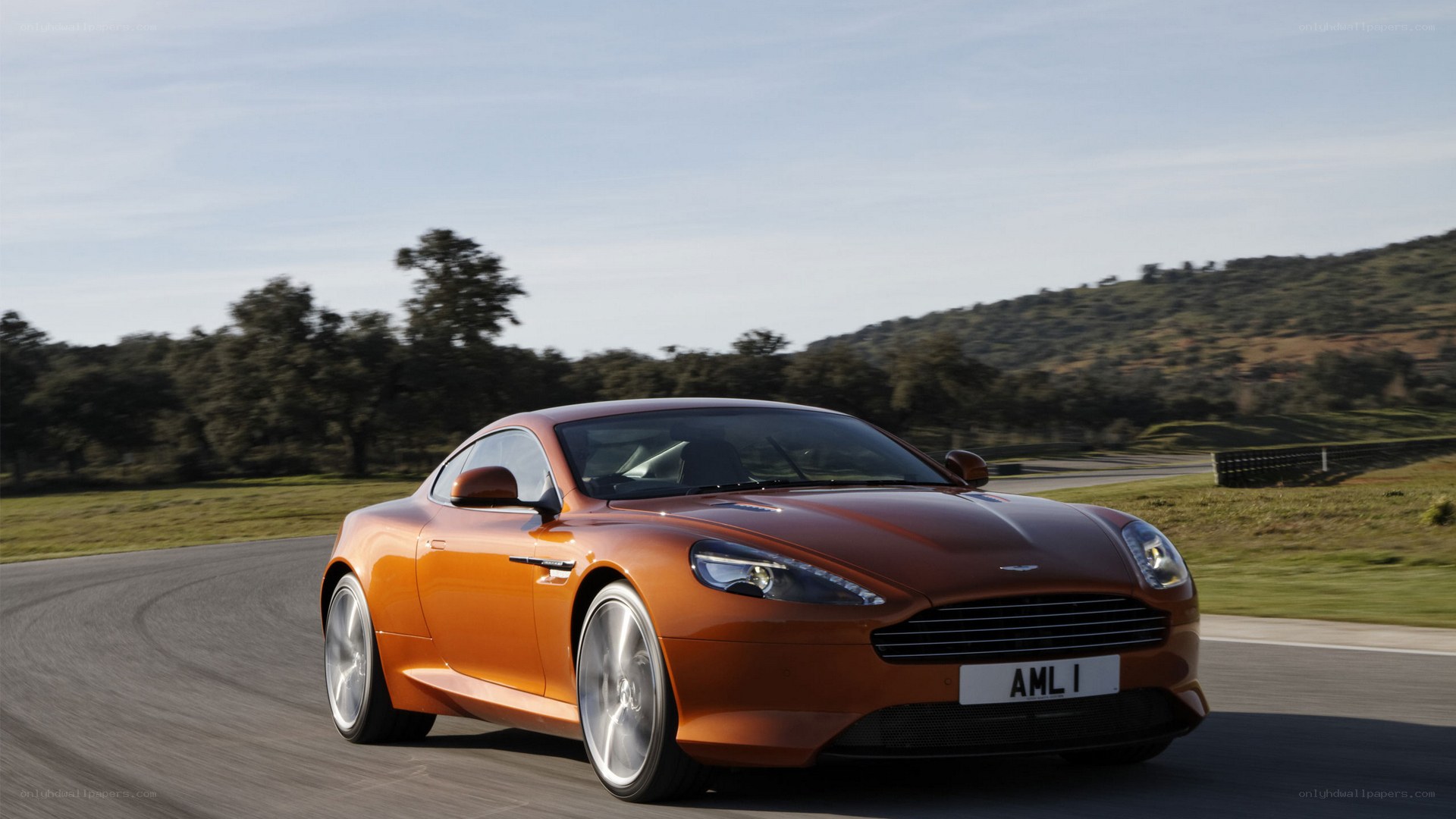 Aston Martin DB9 on a racetrack