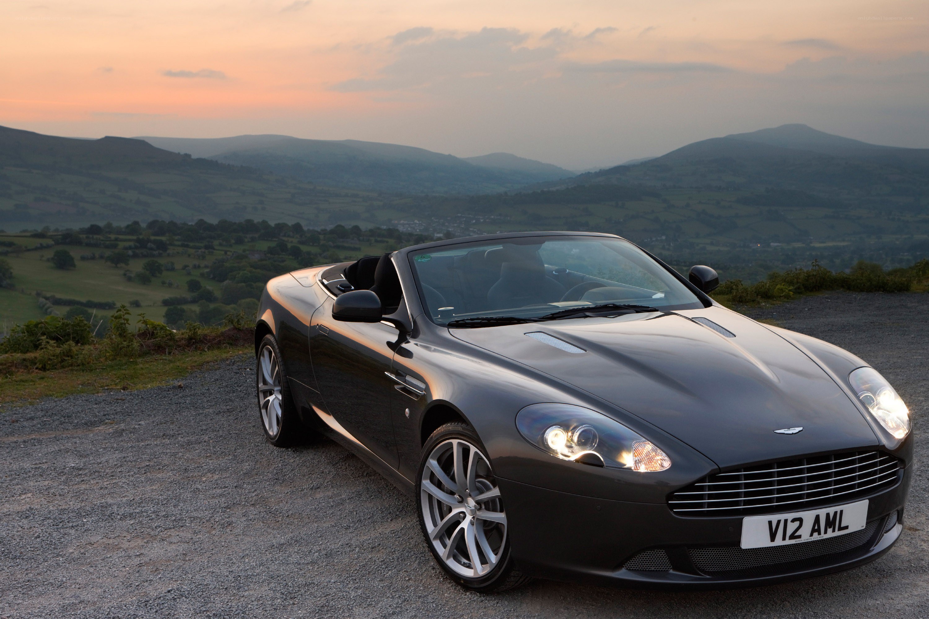 Aston Martin DBS convertible at sunset