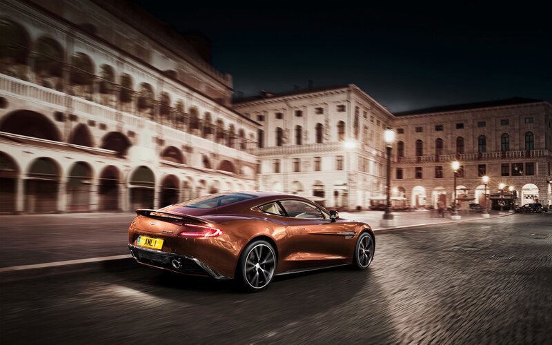 Aston Martin driving at night