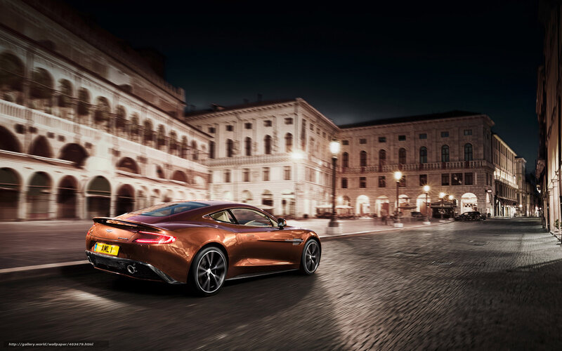 Aston Martin driving at night