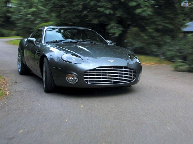 Aston Martin driving on a road