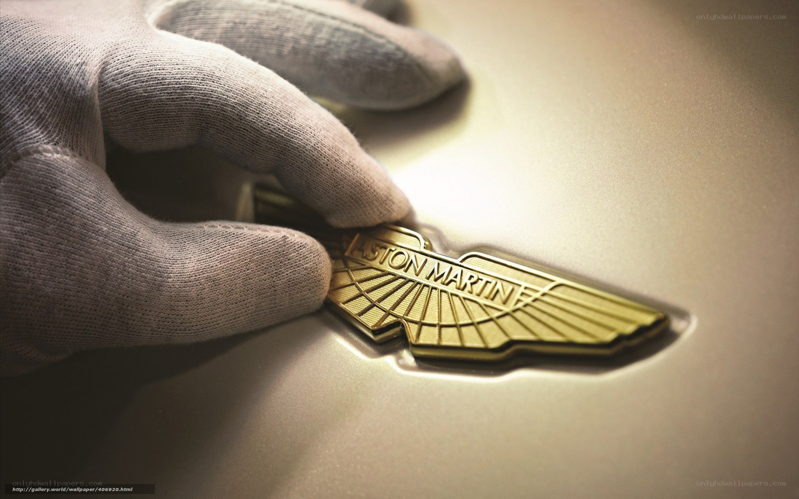 Aston Martin emblem being installed
