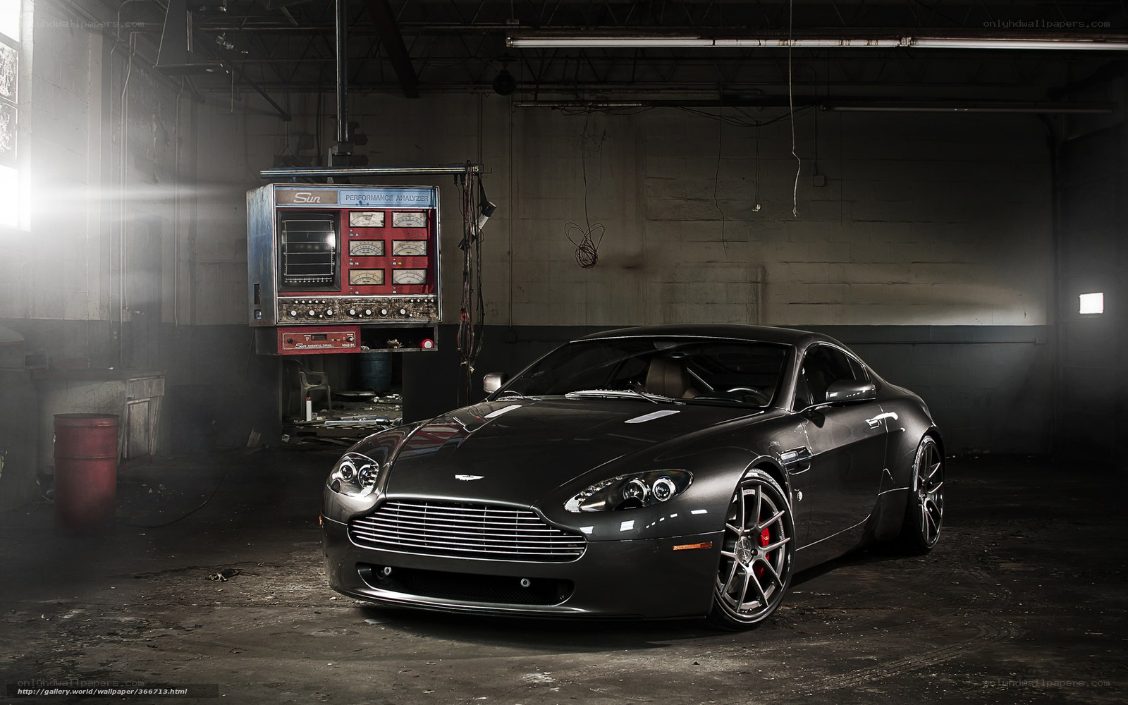 Aston Martin in a dimly lit garage