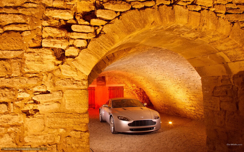 Aston Martin in stone tunnel
