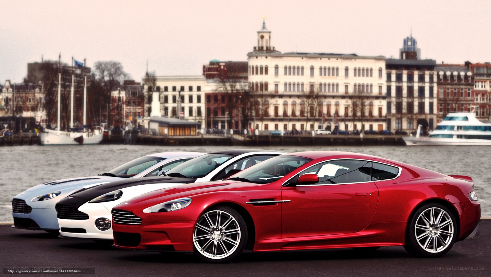 Aston Martin lineup by the water