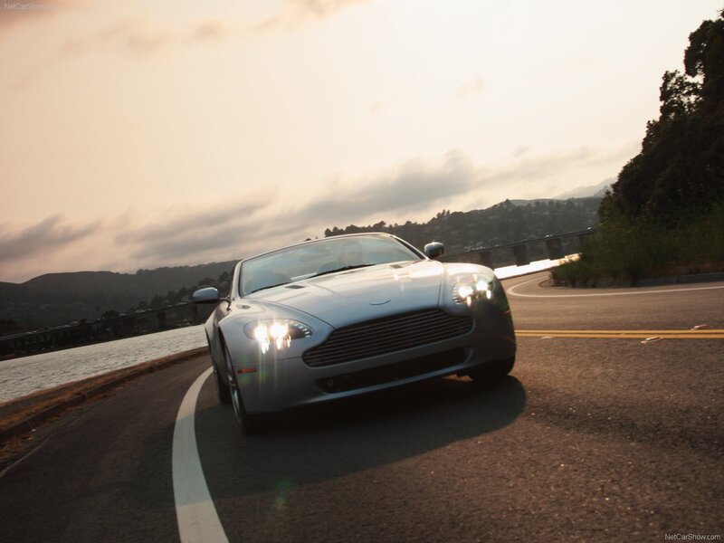 Aston Martin on a coastal road