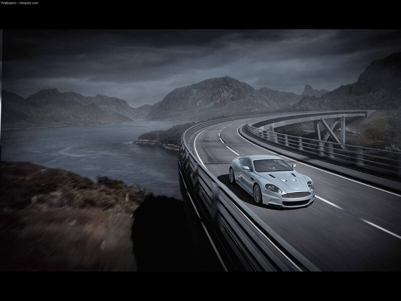 Aston Martin on a coastal road