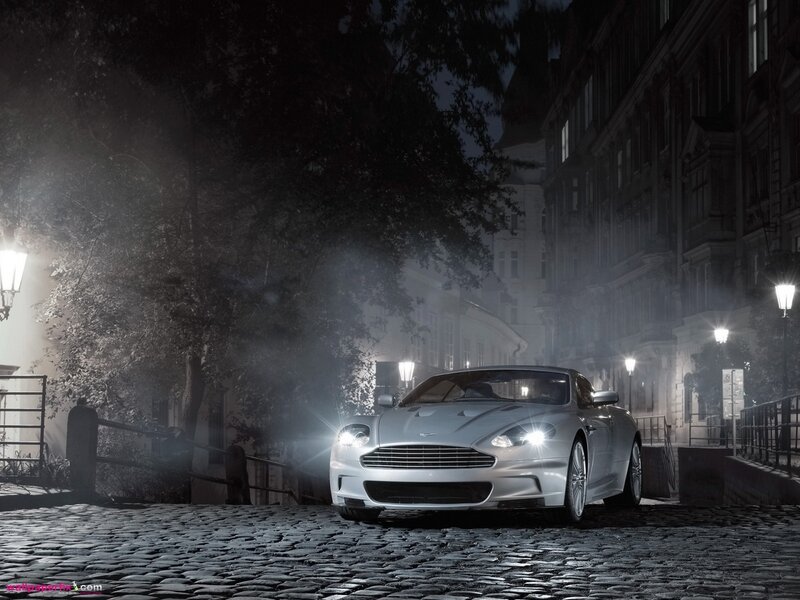 Aston Martin on a cobblestone street