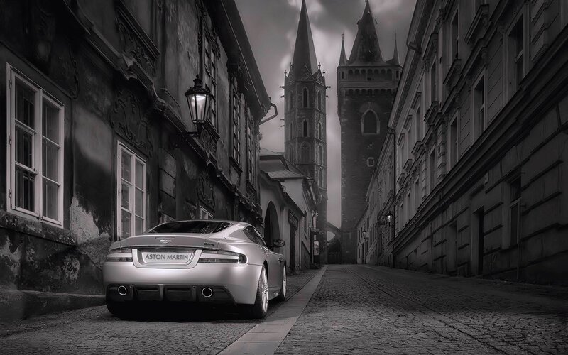 Aston Martin on a cobblestone street