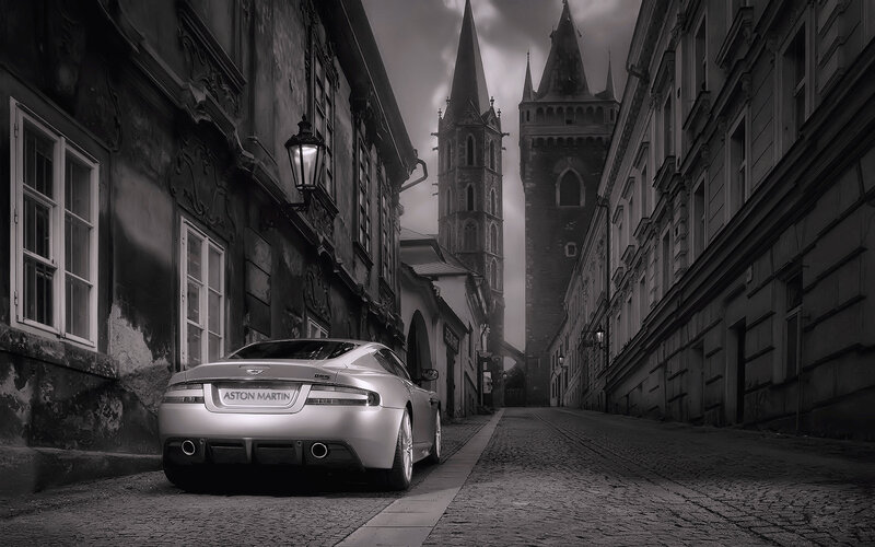Aston Martin on a cobblestone street