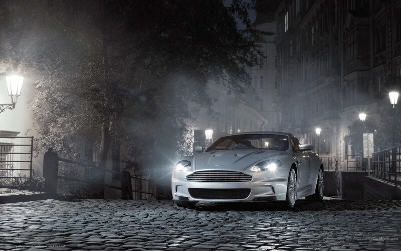 Aston Martin on a cobblestone street