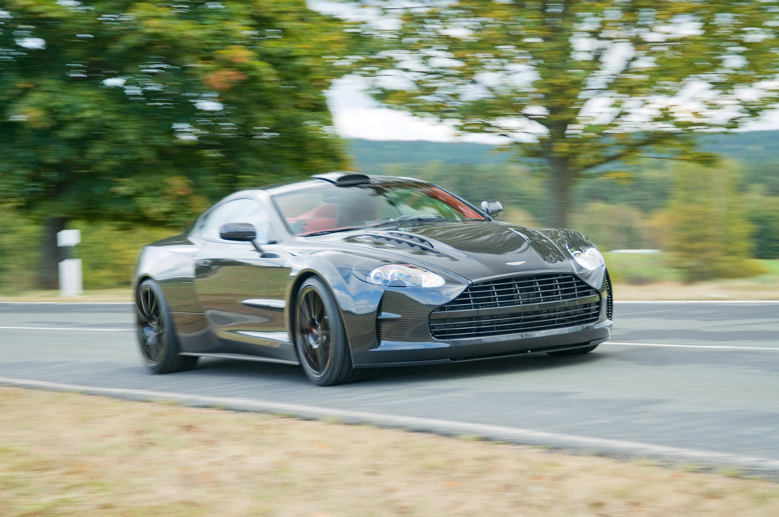 Aston Martin on a country road