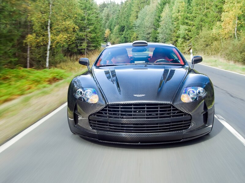 Aston Martin on a forest road