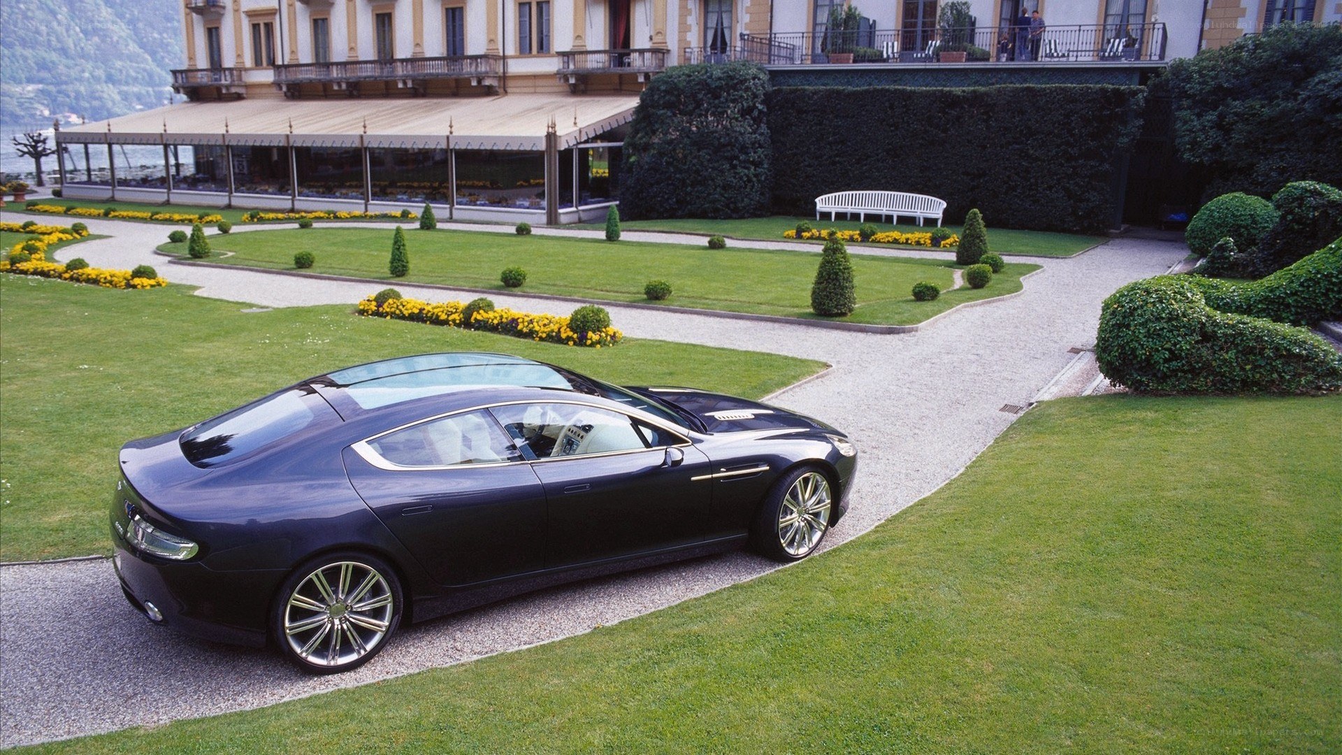 Aston Martin on a garden path