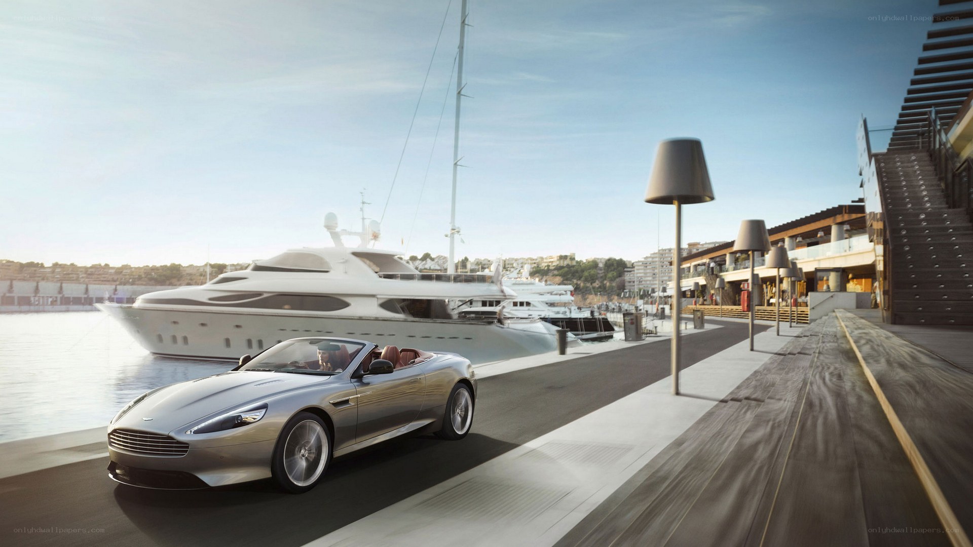 Aston Martin on a marina promenade