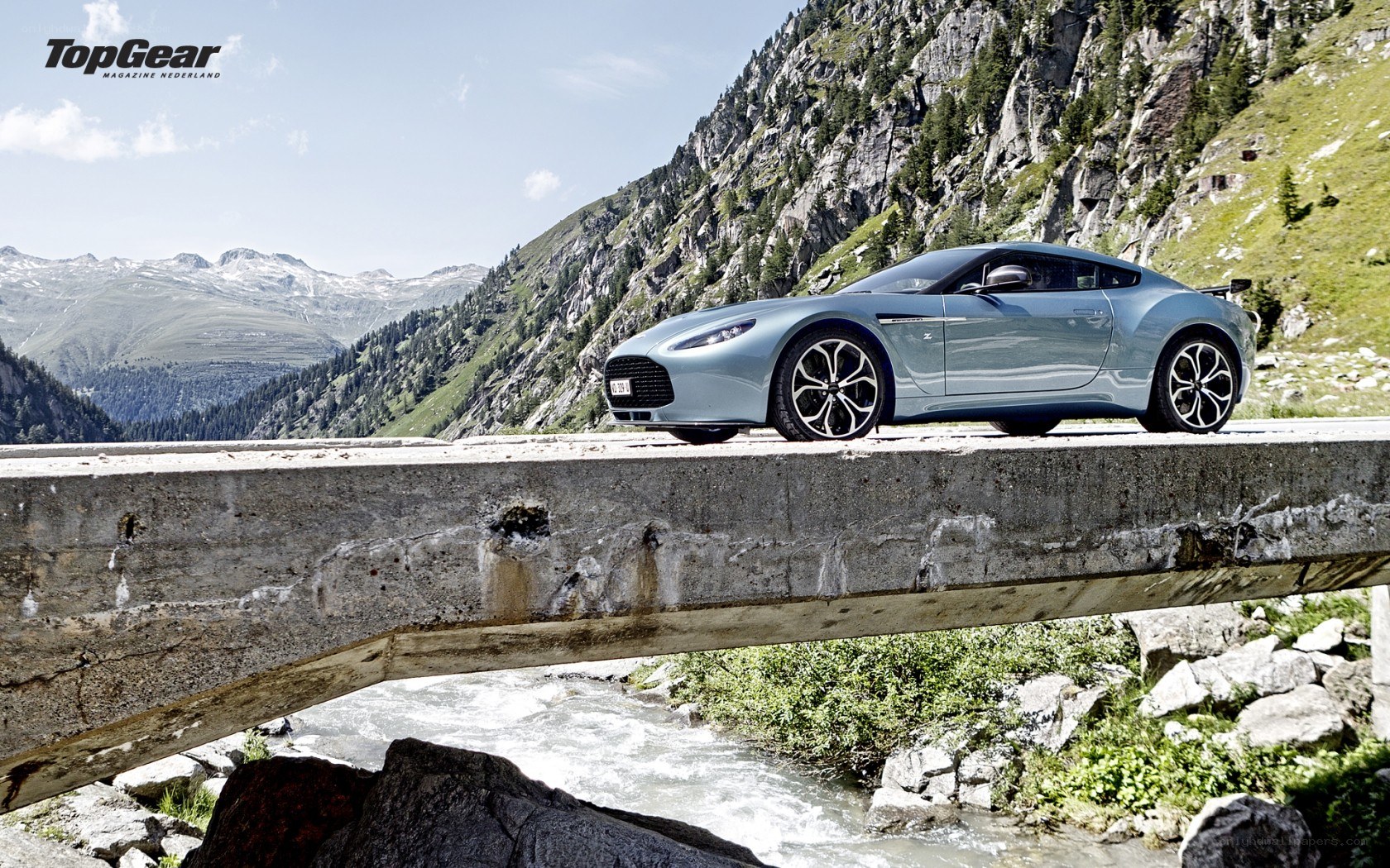 Aston Martin on a mountain bridge