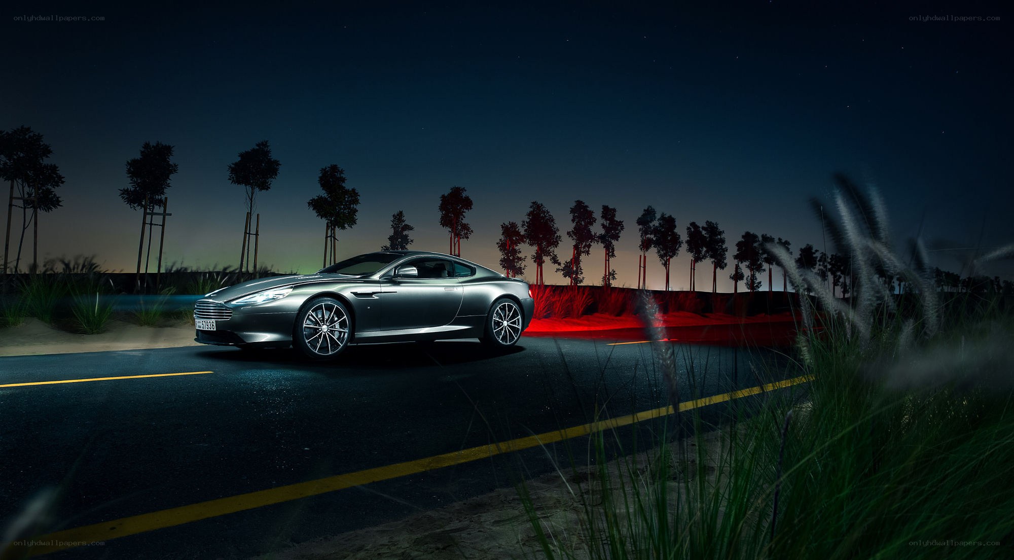 Aston Martin on a night road