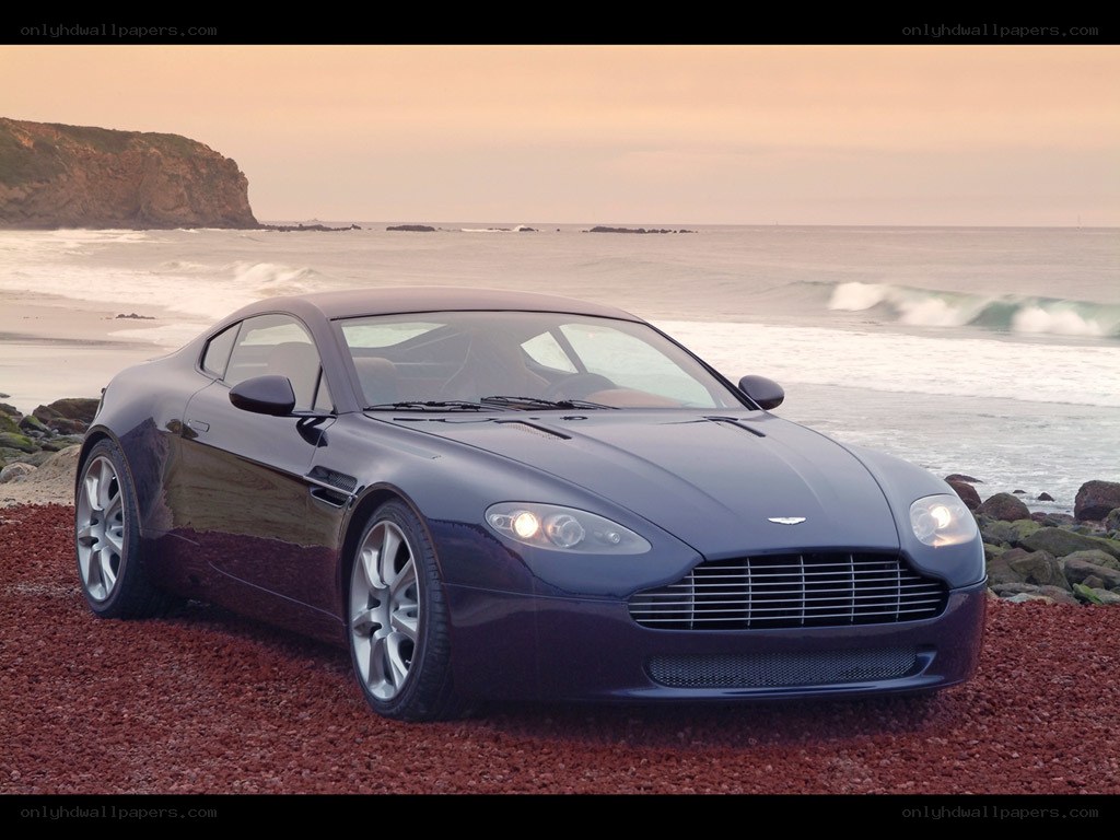 Aston Martin on a pebble beach