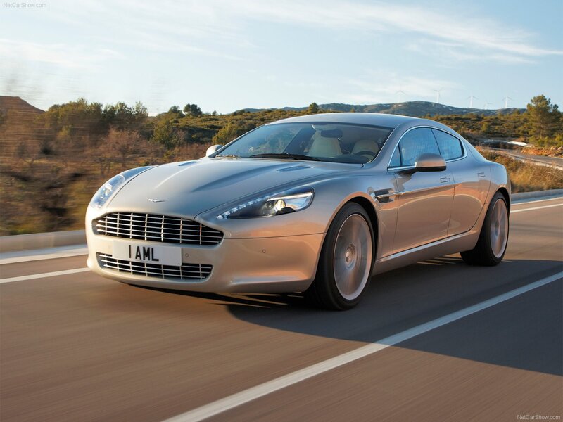 Aston Martin on a scenic road