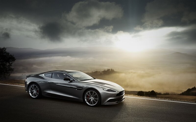 Aston Martin on a scenic road