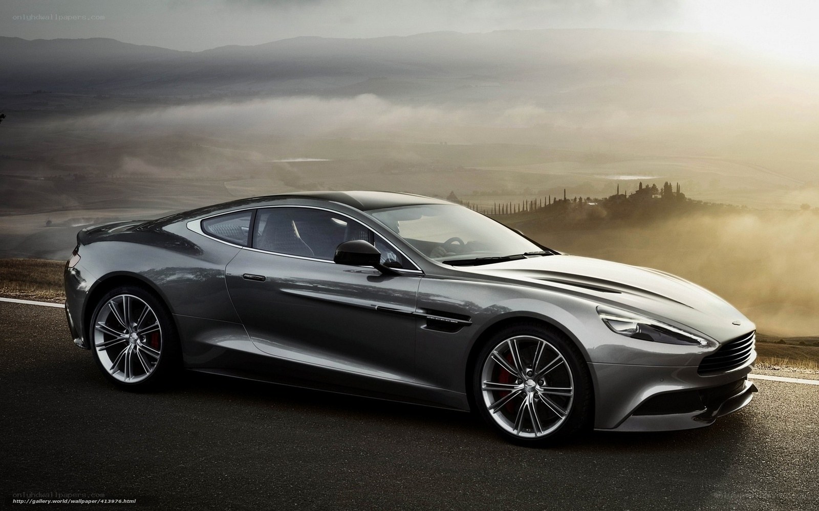 Aston Martin on a scenic road