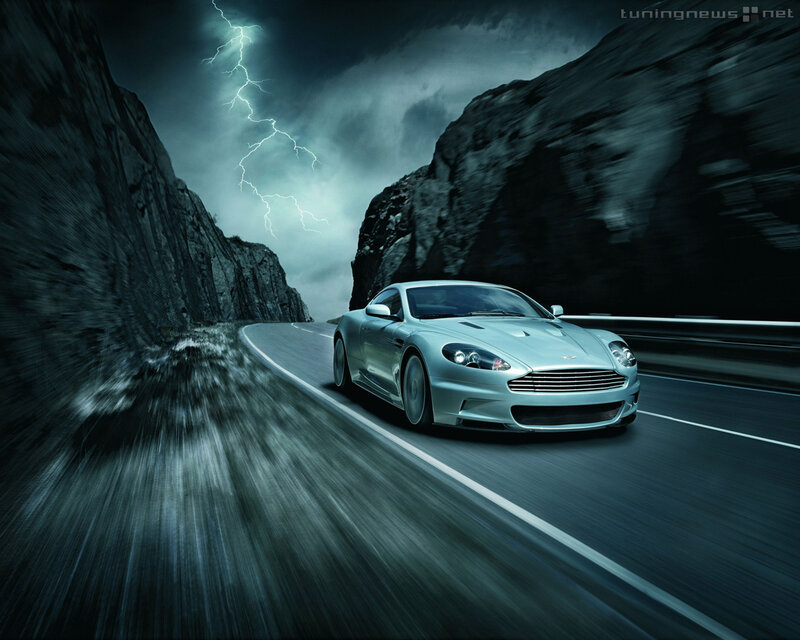 Aston Martin on a stormy road