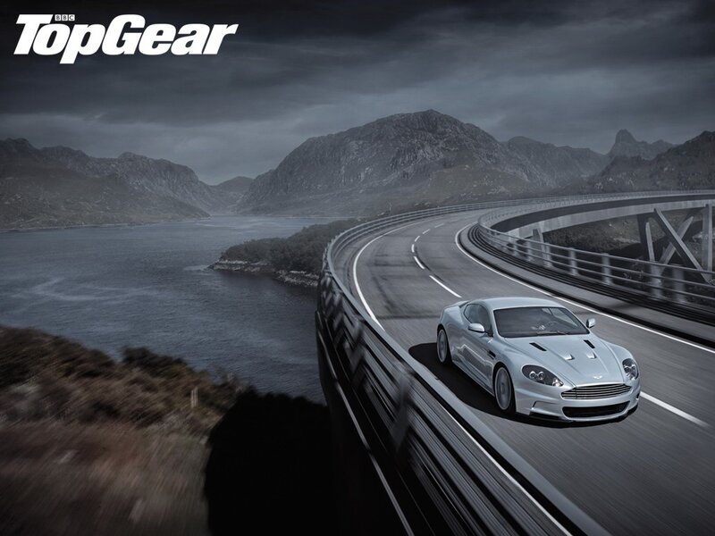 Aston Martin on a winding road
