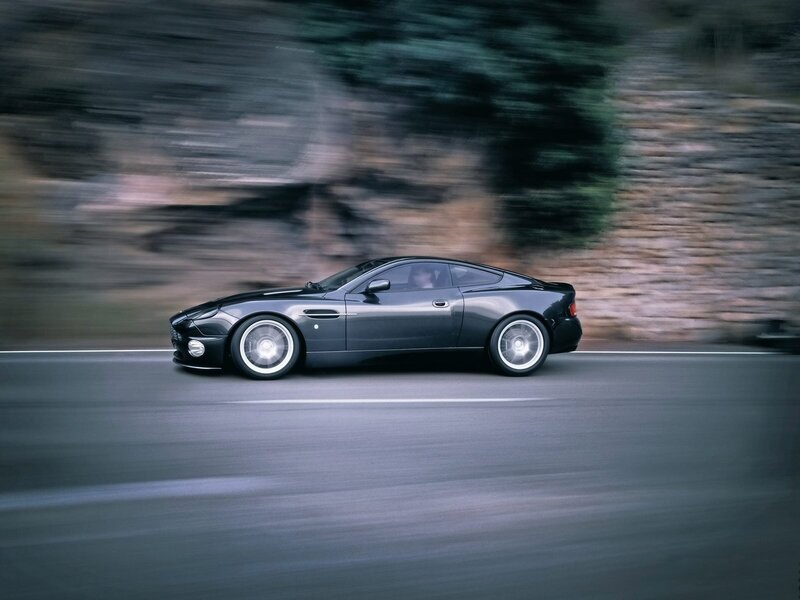Aston Martin on a winding road