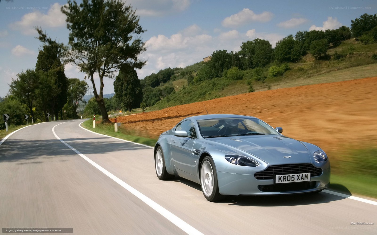 Aston Martin on a winding road