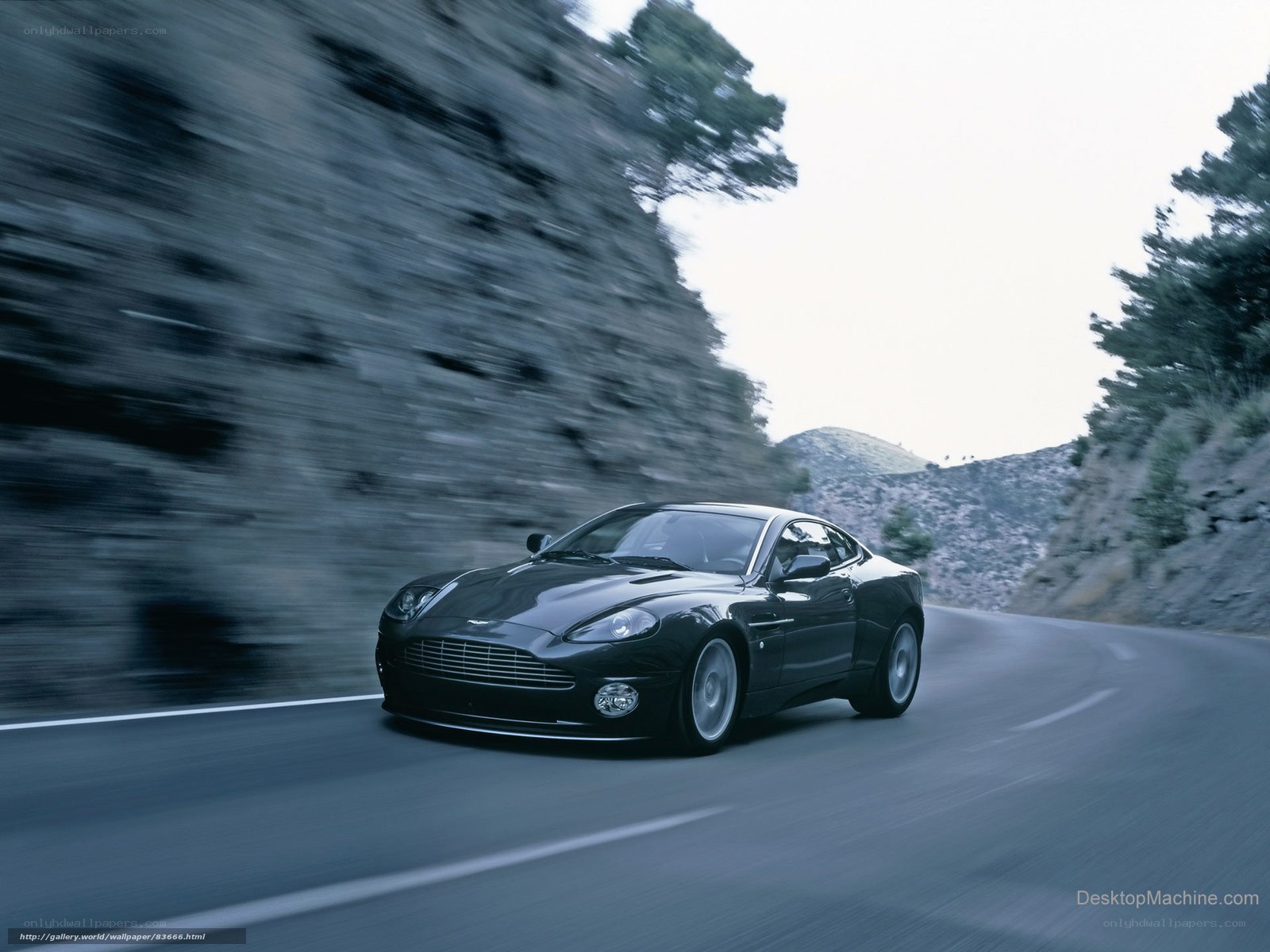 Aston Martin on a winding road