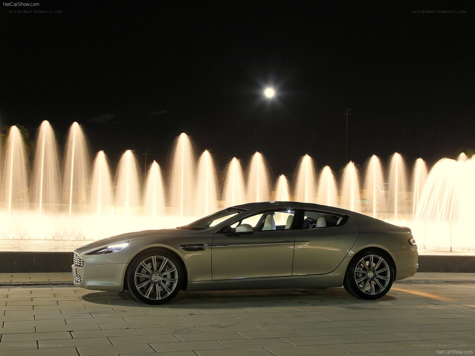 Aston Martin on display at night