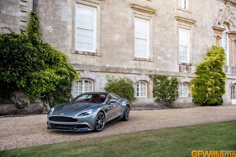 Aston Martin on gravel driveway