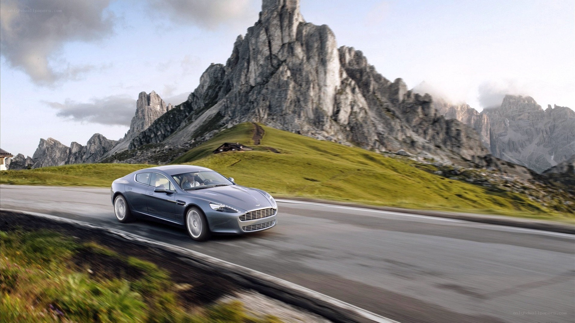 Aston Martin on mountain road